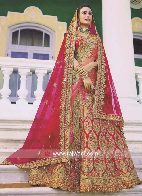 Double Dupatta - one over the head and other draped in normal saree style