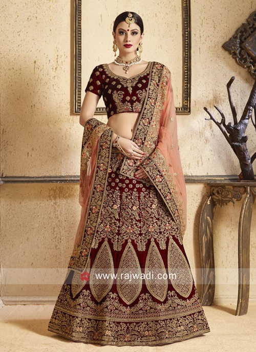 Single dupatta taken over one shoulder and wrapped around wrist on the other